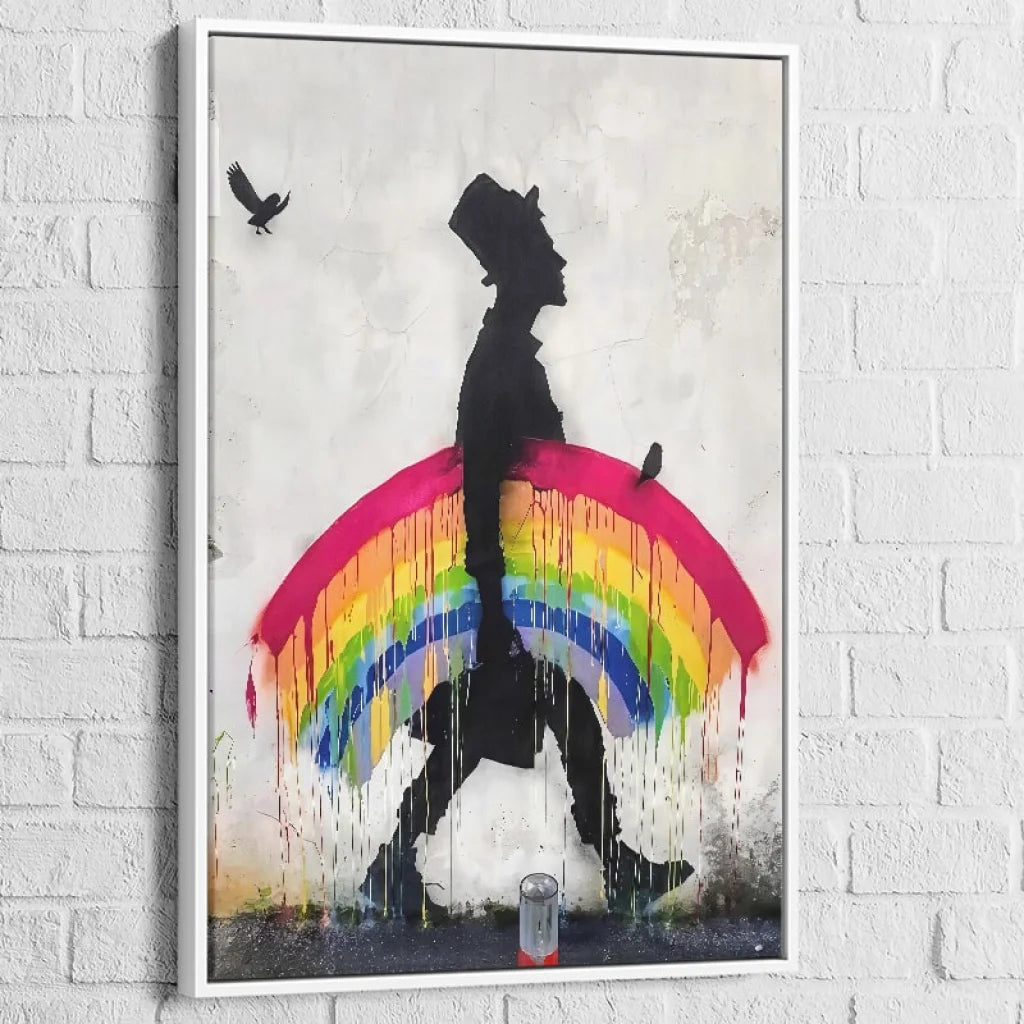 Tableau Banksy – Marcheur à l’Arc-en-Ciel, cadre blanc