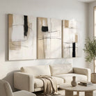 Grand tableau abstrait moderne beige blanc et noir en trois panneaux