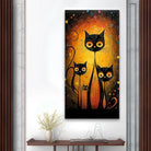 Tableau déco chats noirs stylisés devant un fond lumineux orange avec fleurs colorées - Les Gardiens de la Nuit

