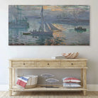Tableau Claude Monet Impression, soleil levant au-dessus d’un canapé