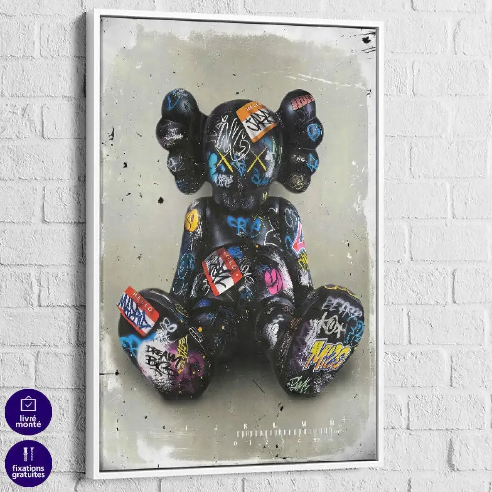 tableau kaws black pop avec cadre blanc