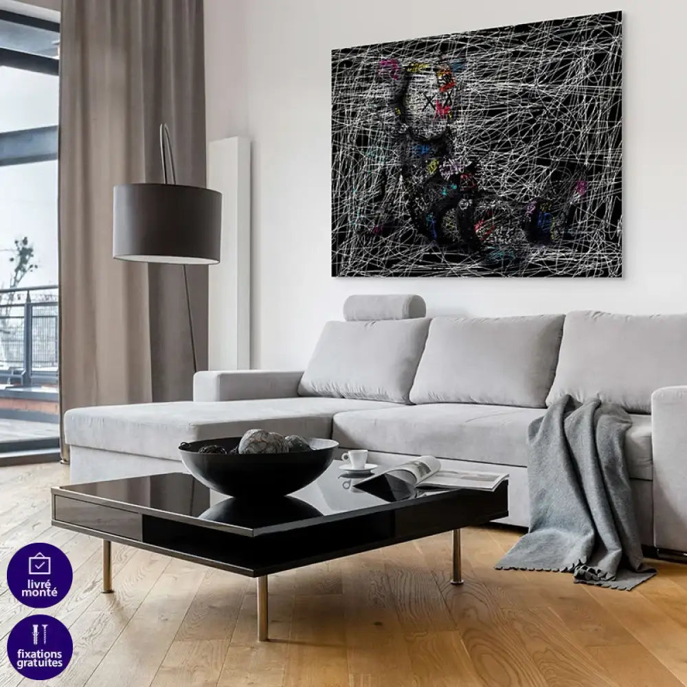 tableau kaws le dormeur de craie personnage assis lignes de craie sur fond noir